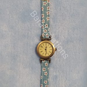 Montre bracelet en tissu bleu fleuri
