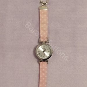 Montre bracelet en tissu rose à pois blanc