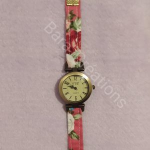 Montre bracelet en tissu rose fleuri