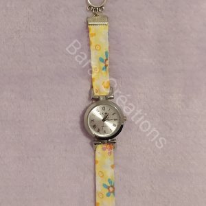 Montre bracelet en tissu jaune fleuri